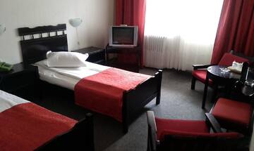 Фото номера Двухместный номер эконом-класса с 2 отдельными кроватями Отель Hotel Tusnad г. Бэиле-Тушнад 4