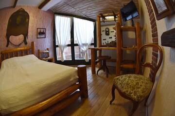 Фото номера Двухместный номер с 1 кроватью Отель Fortuna Eco - Boutique Hotel г. Бэиле-Тушнад 6